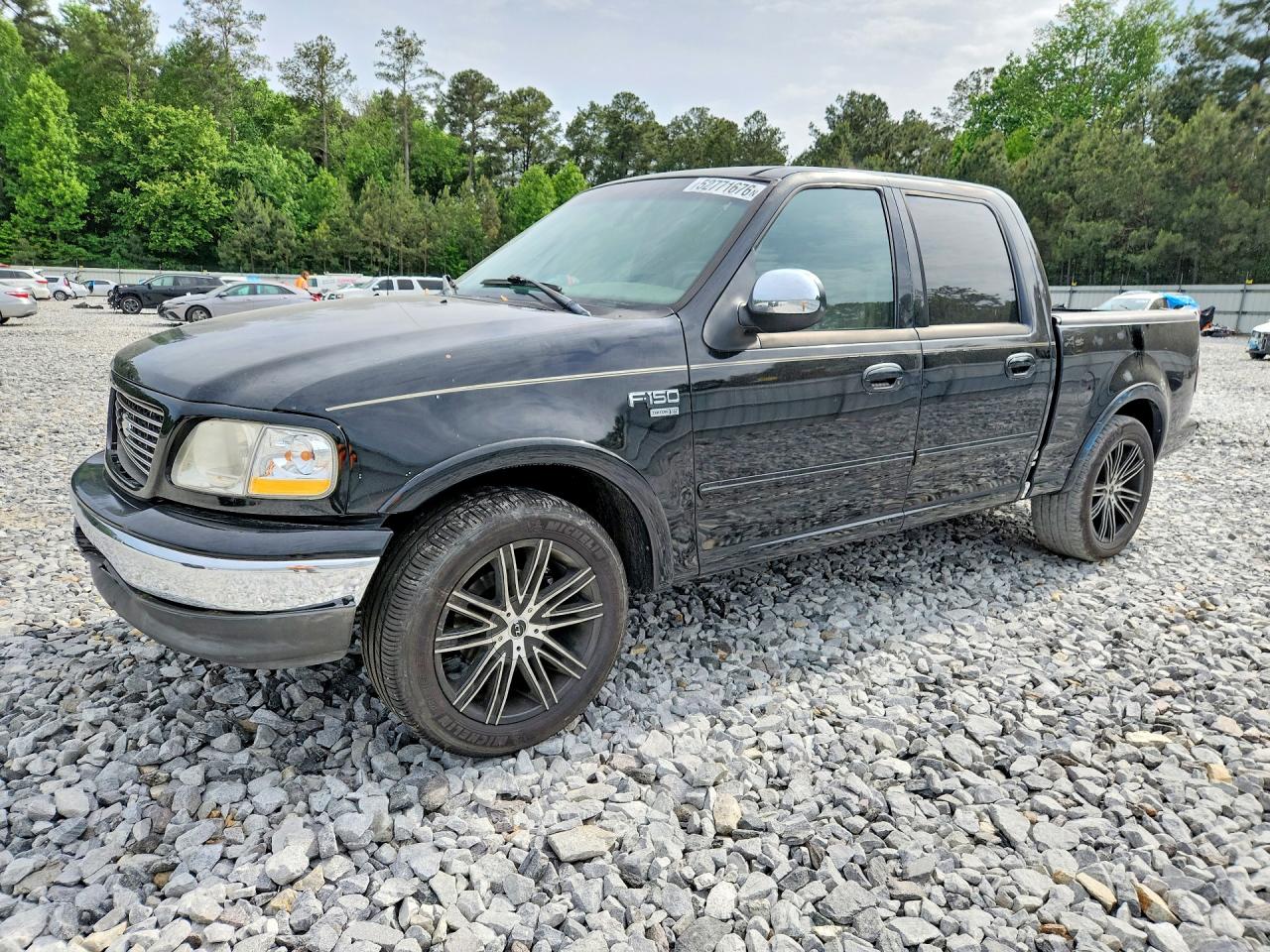 2002 Ford F150 VIN 1FTRW07L42KA48663 photo 1