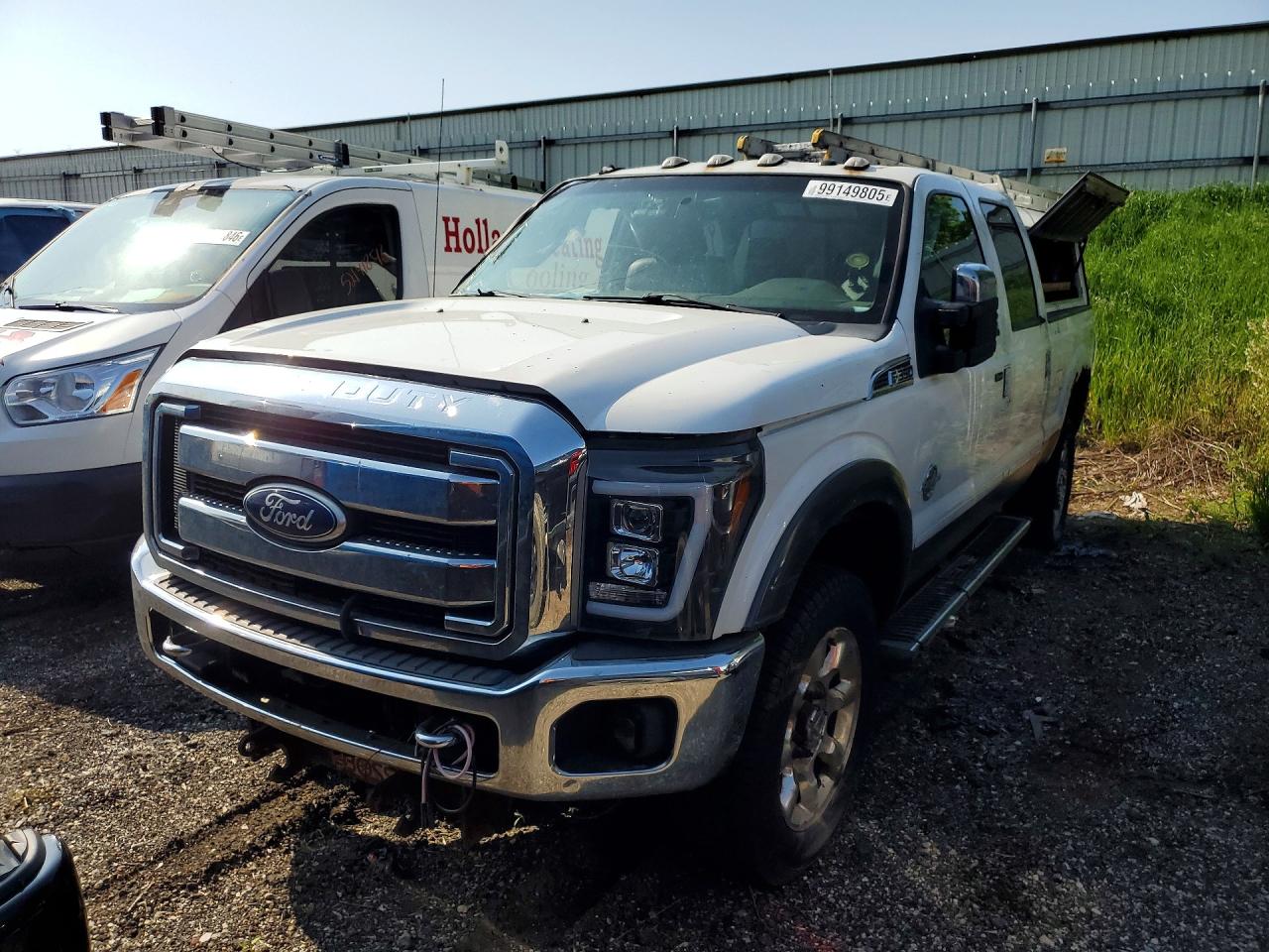 2011 Ford F350 VIN 1FT8W3BT3BEA55297 photo 1