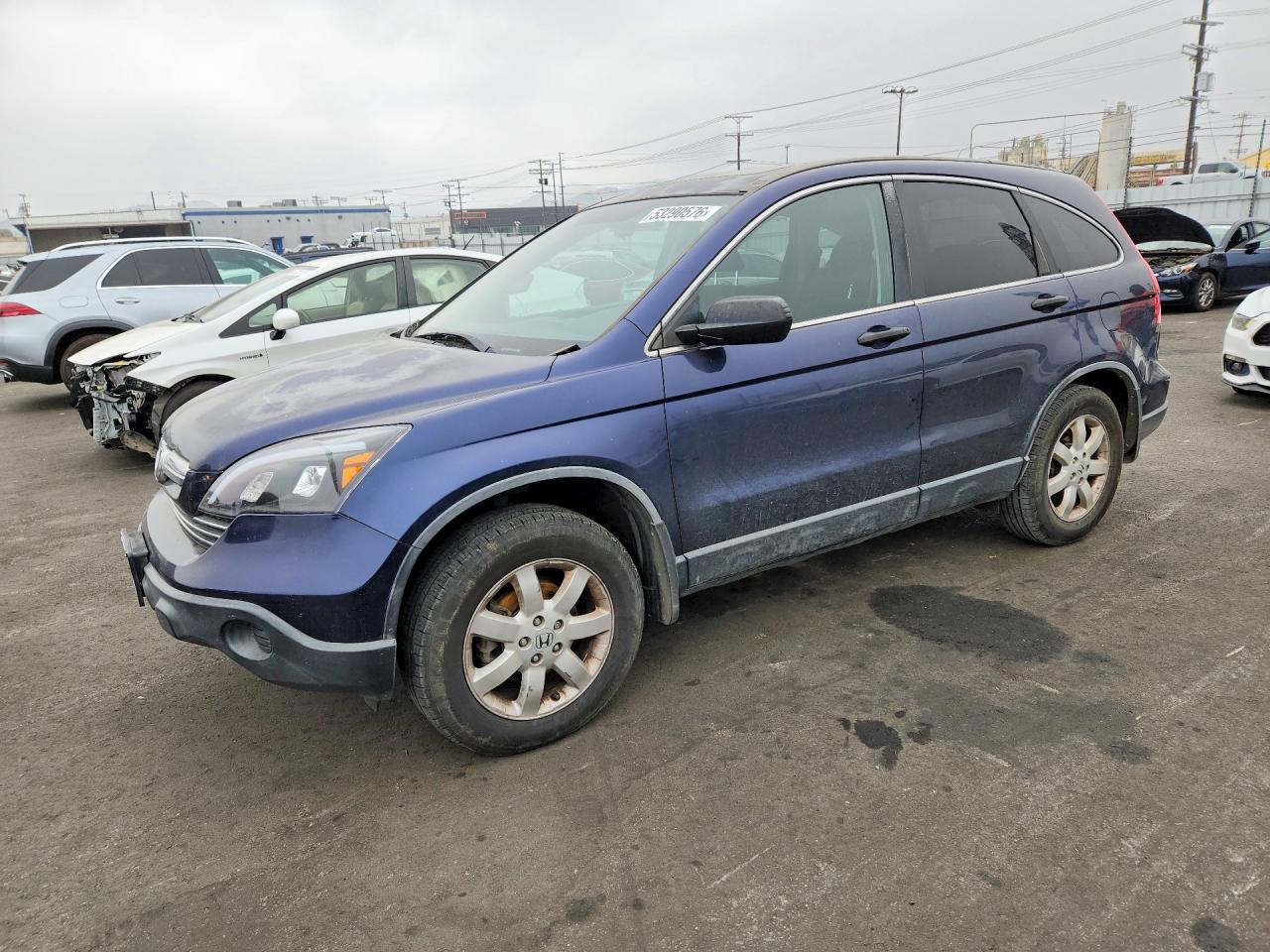 2009 Honda Crv VIN JHLRE38519C001425 photo 1