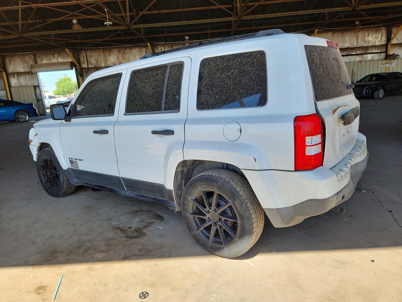 2014 Jeep Patriot VIN 1C4NJPBA7ED775123 photo 2