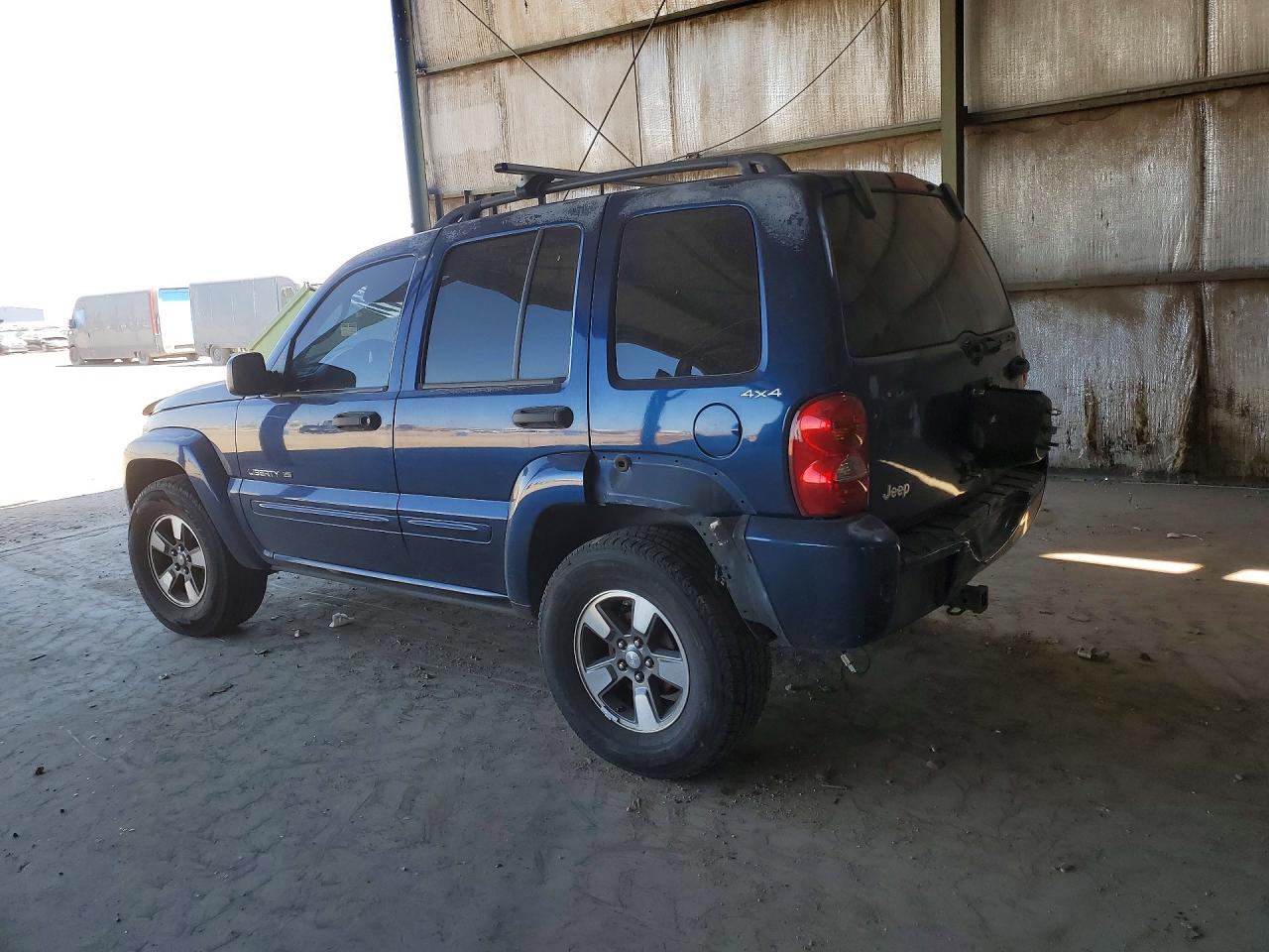 2002 Jeep Liberty VIN 1J4GL58K82W270919 photo 2