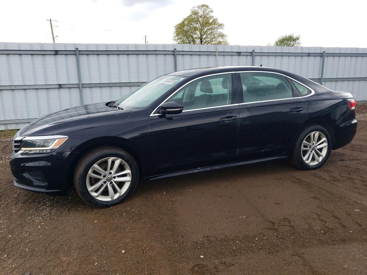 2021 Volkswagen Passat VIN 1VWBA7A3XMC002900 photo 1