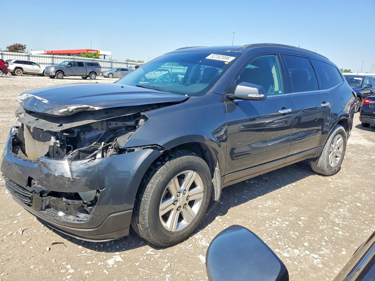 2014 Chevrolet Traverse VIN 1GNKRHKD1EJ113400 photo 1