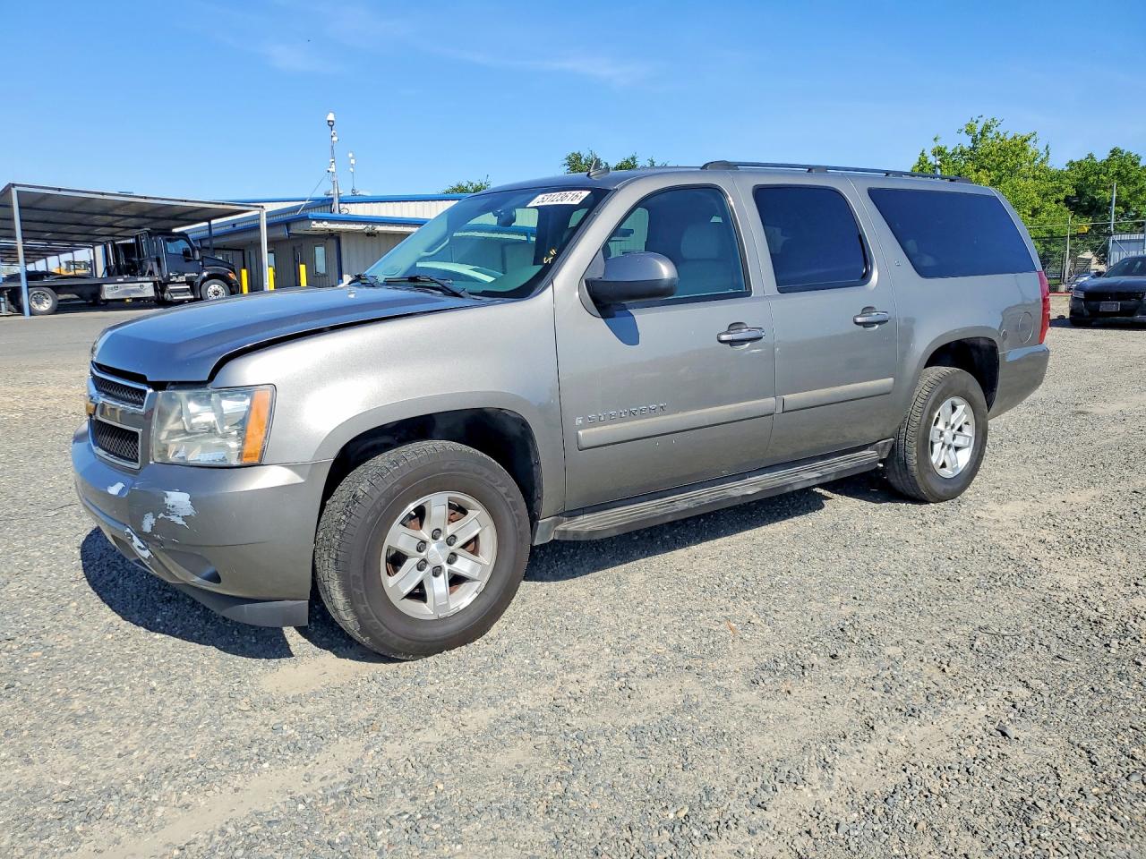 2007 Chevrolet Suburban VIN 1GNFK16387J166953 photo 1