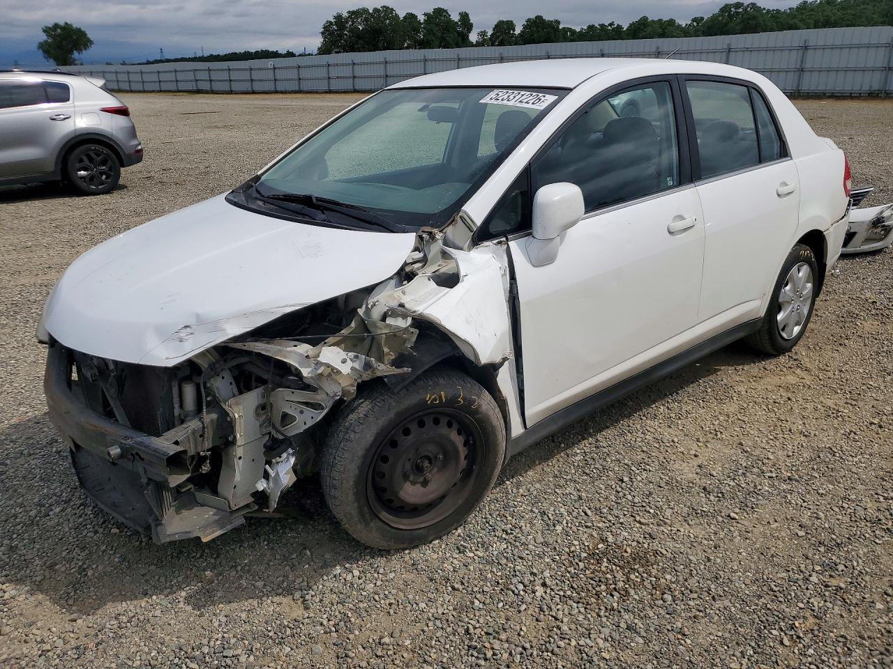 2008 Nissan Versa VIN 3N1BC11E08L389840 photo 1