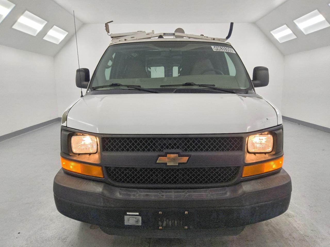 2011 CHEV Express VIN 1GCWGFCB6B1130139 photo 5