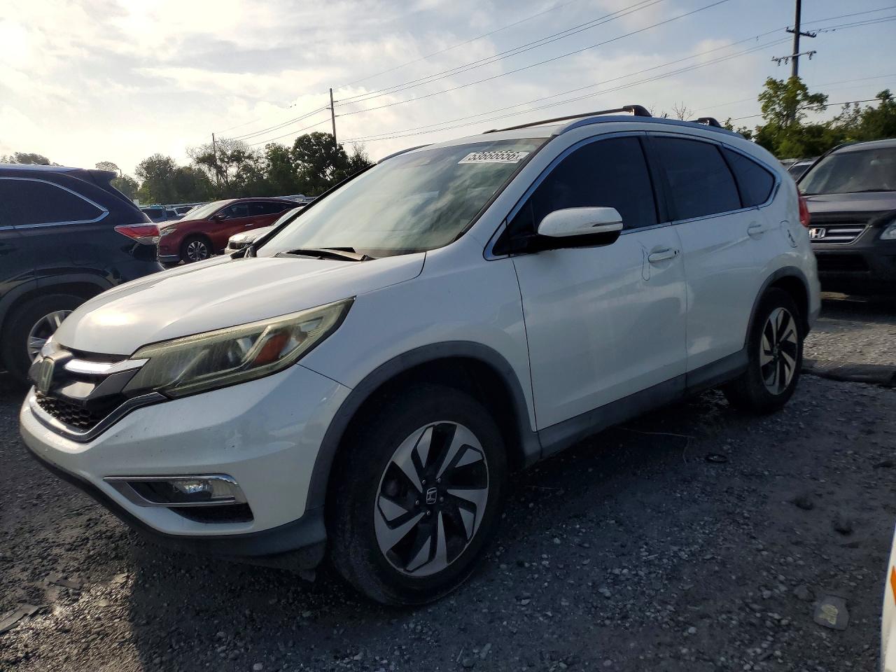 2015 Honda Crv VIN 5J6RM3H96FL017404 photo 1
