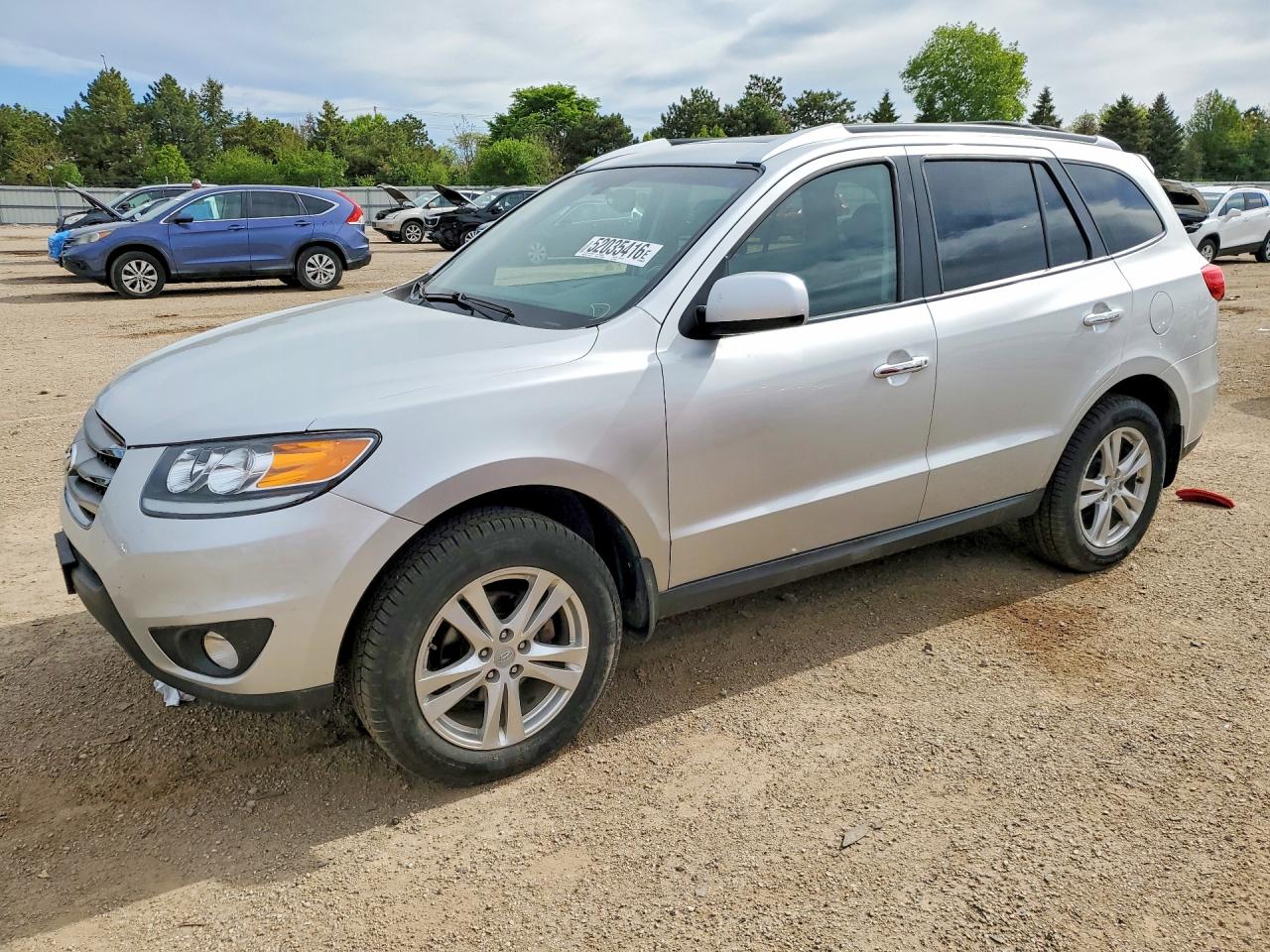 2012 Hyundai Santa fe VIN 5XYZKDAG9CG159683 photo 1