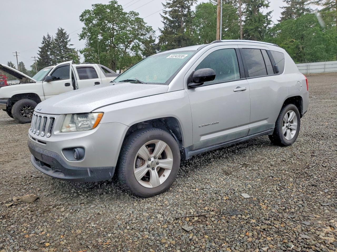 2011 Jeep Compass VIN 1J4NT1FA4BD215762 photo 1
