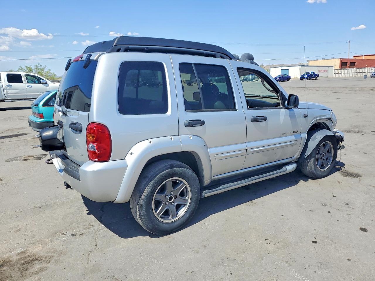 2003 Jeep Liberty VIN 1J4GL38K83W515479 photo 3