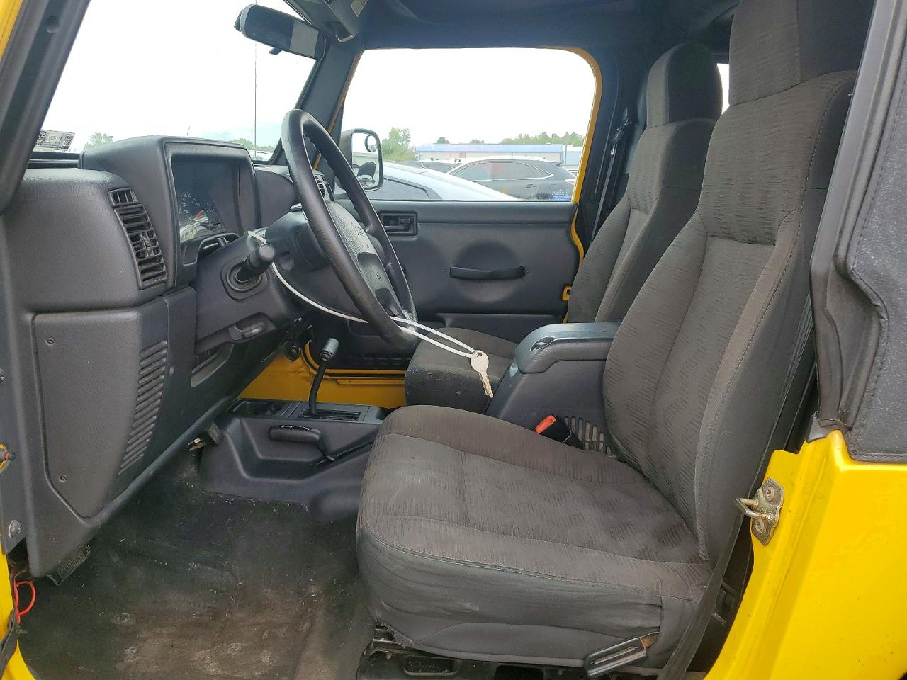 2004 Jeep Wrangler / VIN 1J4FA39S94P708574 photo 7