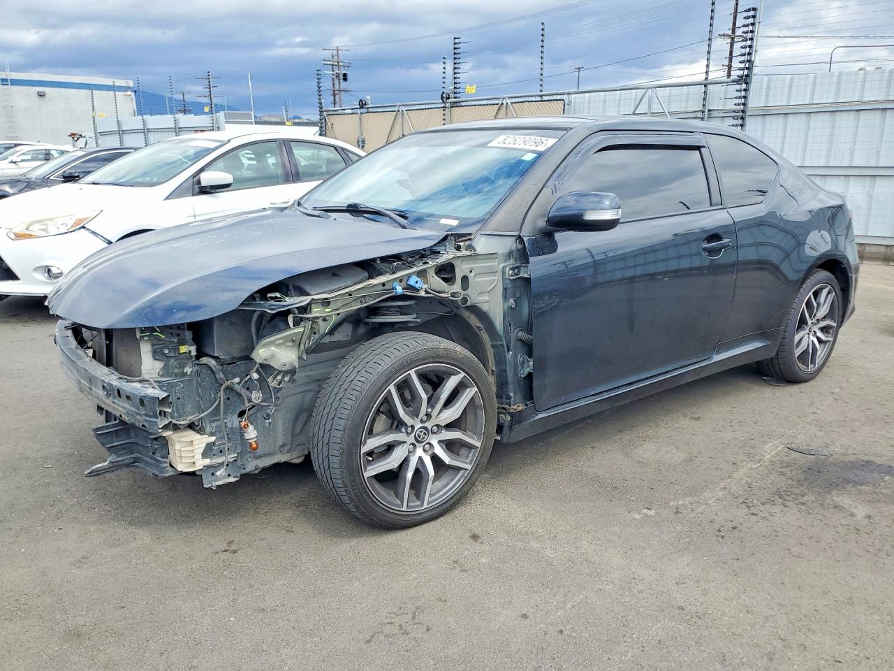 2015 Scion Tc VIN JTKJF5C73FJ004824 photo 1