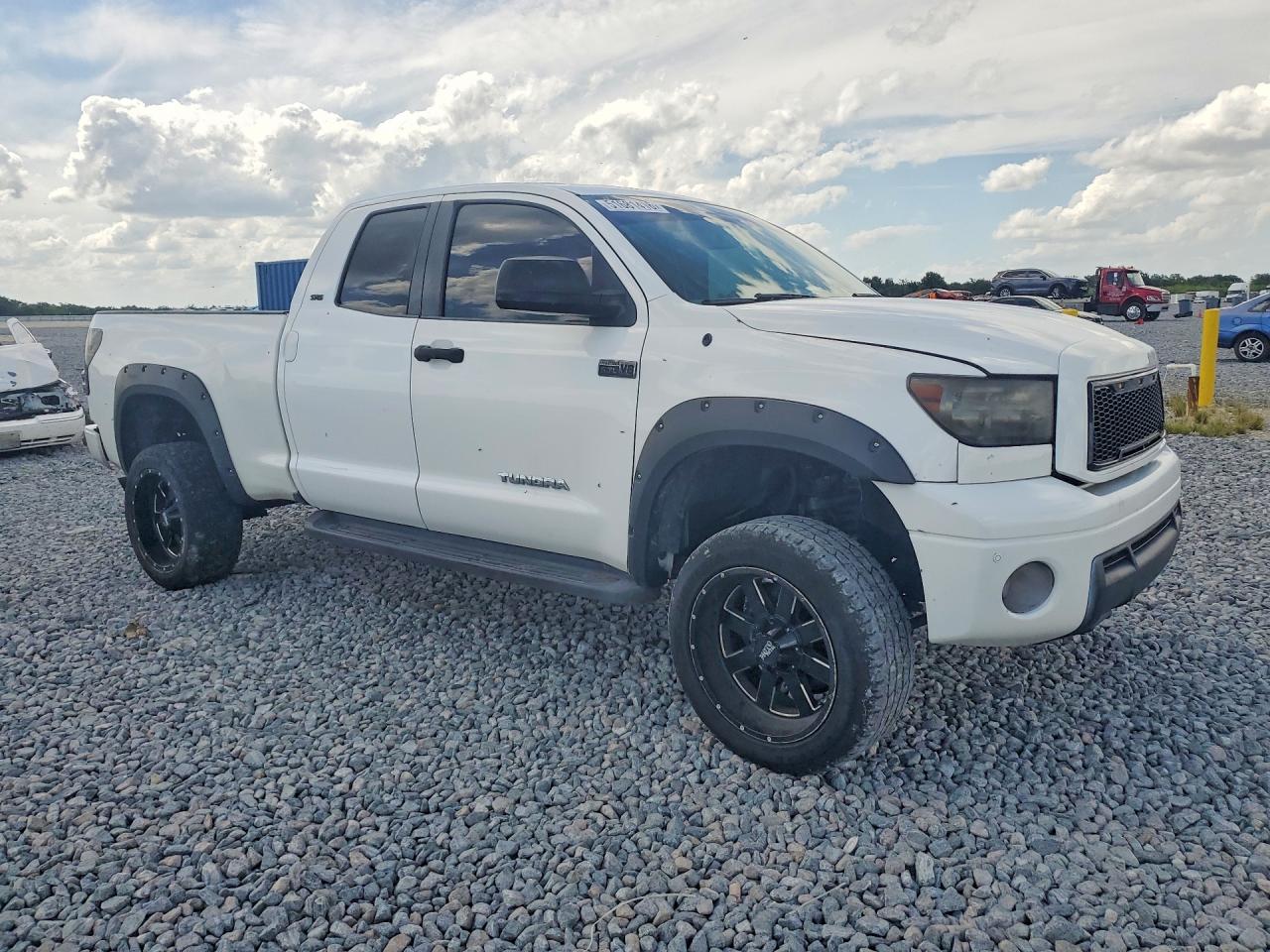 2011 Toyota Tundra VIN 5TFRM5F16BX034253 photo 4