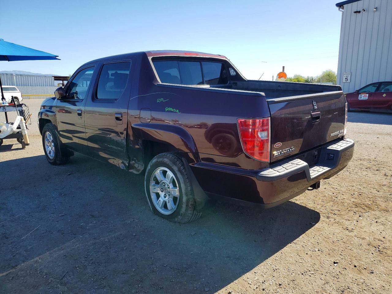 2011 Honda Ridgeline VIN 5FPYK1F41BB010965 photo 2