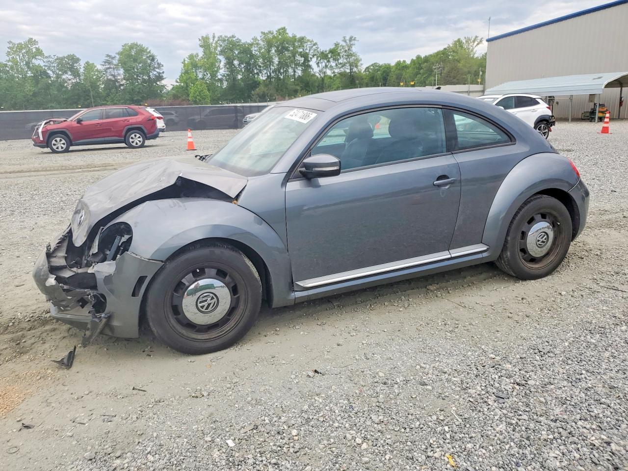 2013 Volkswagen Beetle VIN 3VWJP7ATXDM663271 photo 1