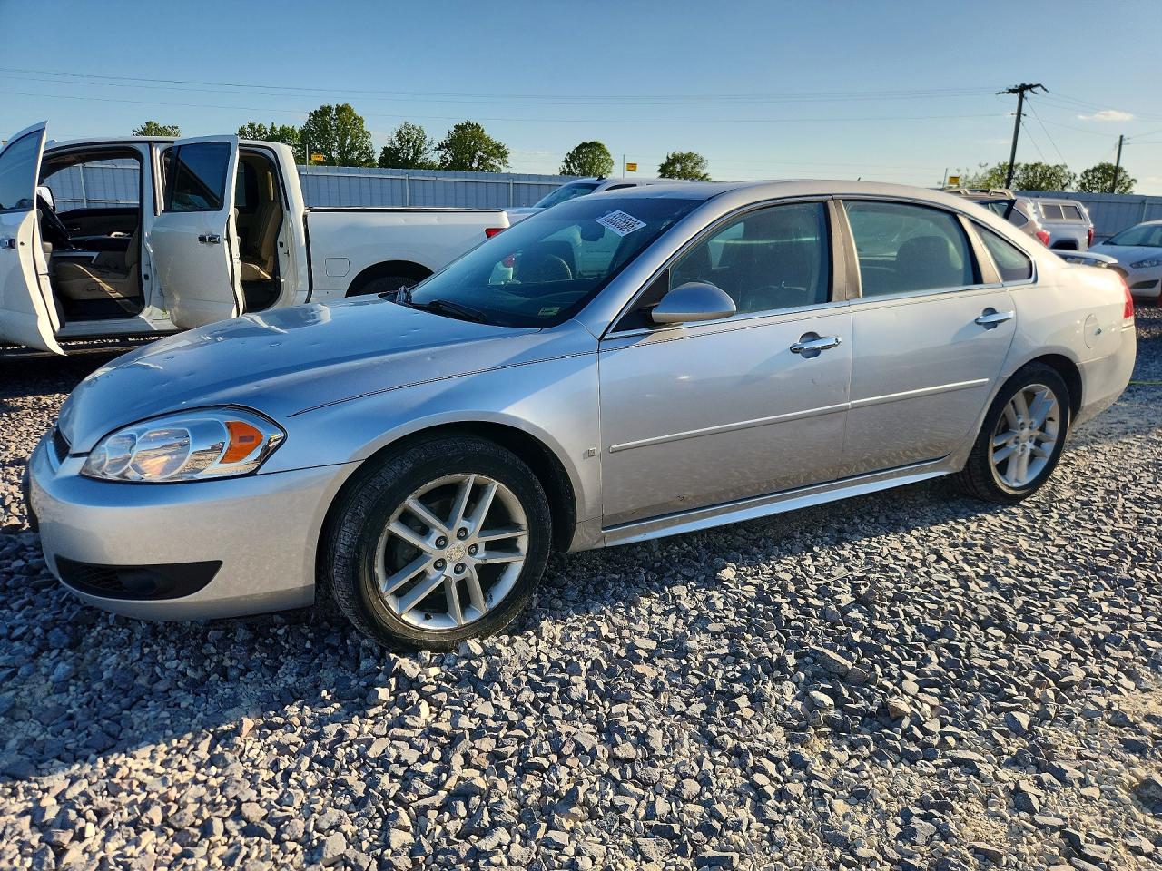 2015 Chevrolet Impala VIN 2G1WC5E33F1142625 photo 1