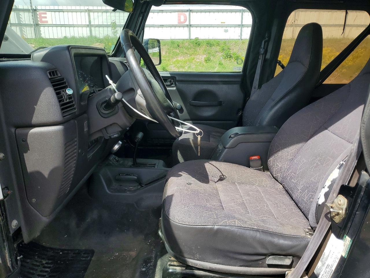 2002 Jeep Wrangler / VIN 1J4FA49S22P768280 photo 7