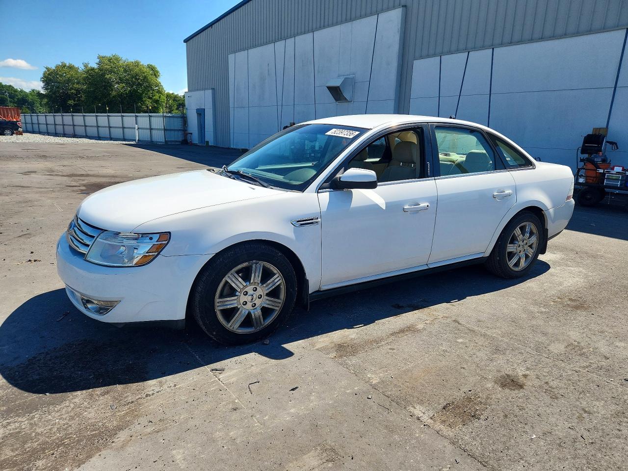 2008 Ford Taurus VIN 1FAHP24W98G128657 photo 1