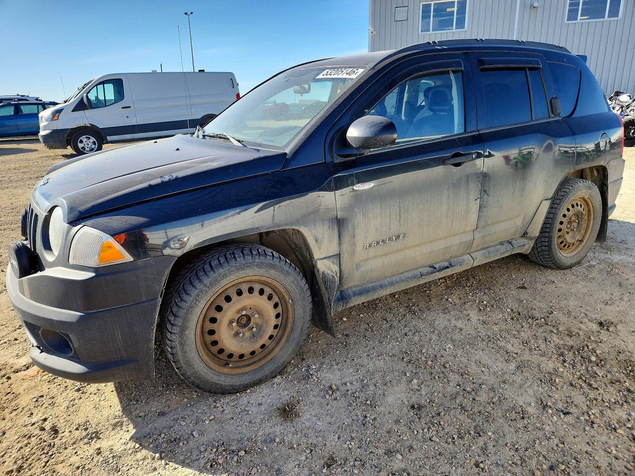 2009 Jeep Compass VIN 1J4FF47B59D105849 photo 1