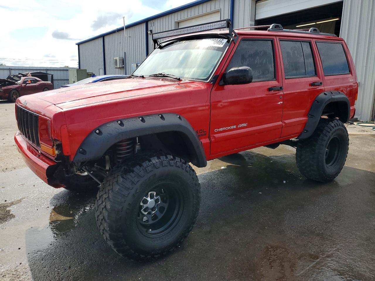 1999 Jeep Grand cher VIN 1J4FF68S7XL657026 photo 1