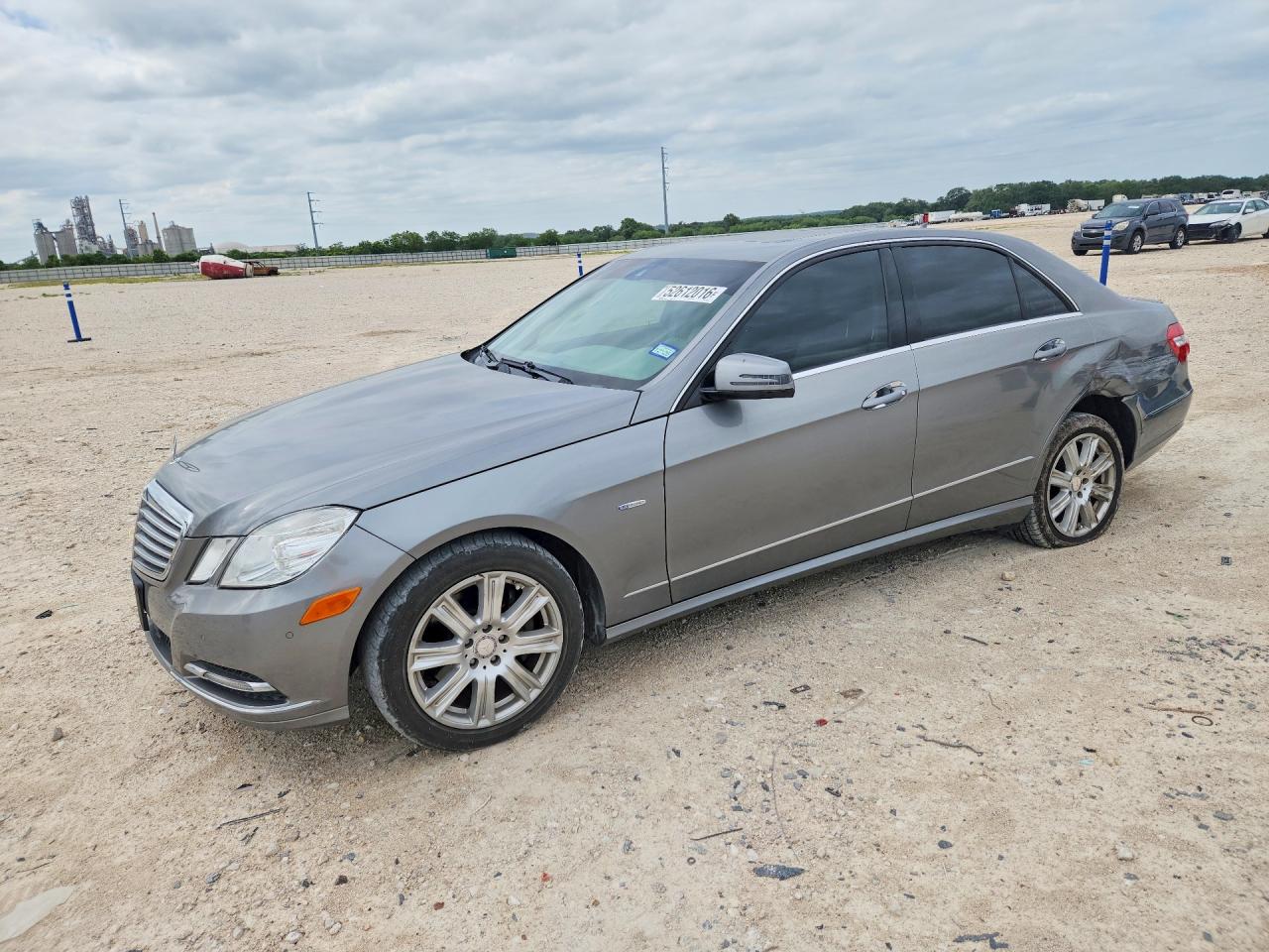 2012 Mercedes-Benz E-class VIN WDDHF5KB1CA588699 photo 1