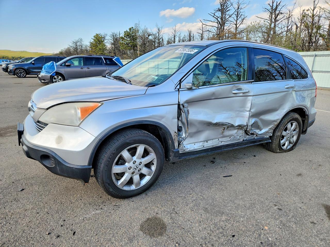 2009 Honda Crv VIN JHLRE48799C015144 photo 1