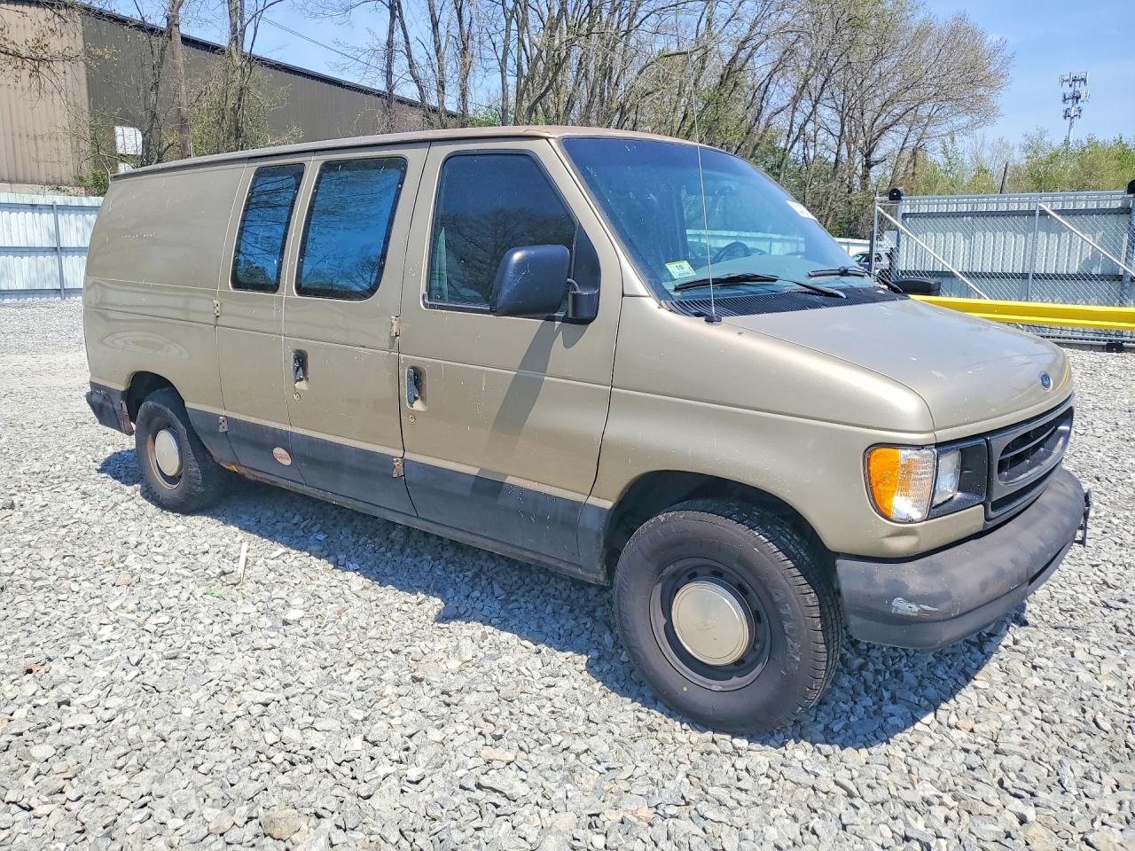 1999 Ford Econoline VIN 1FTRE1429XHB96087 photo 4