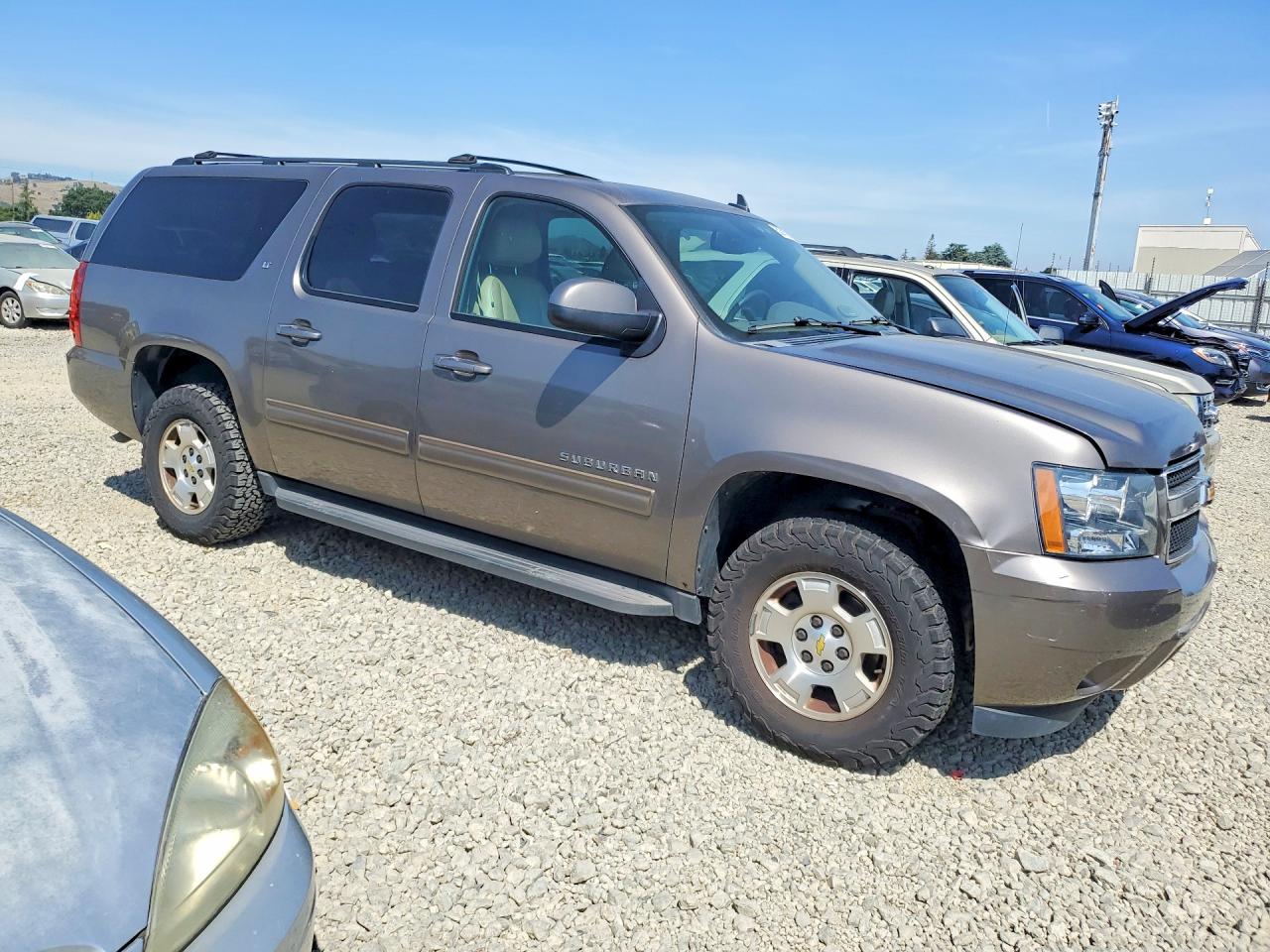 2012 Chevrolet Suburban VIN 1GNSKJE7XCR191707 photo 4