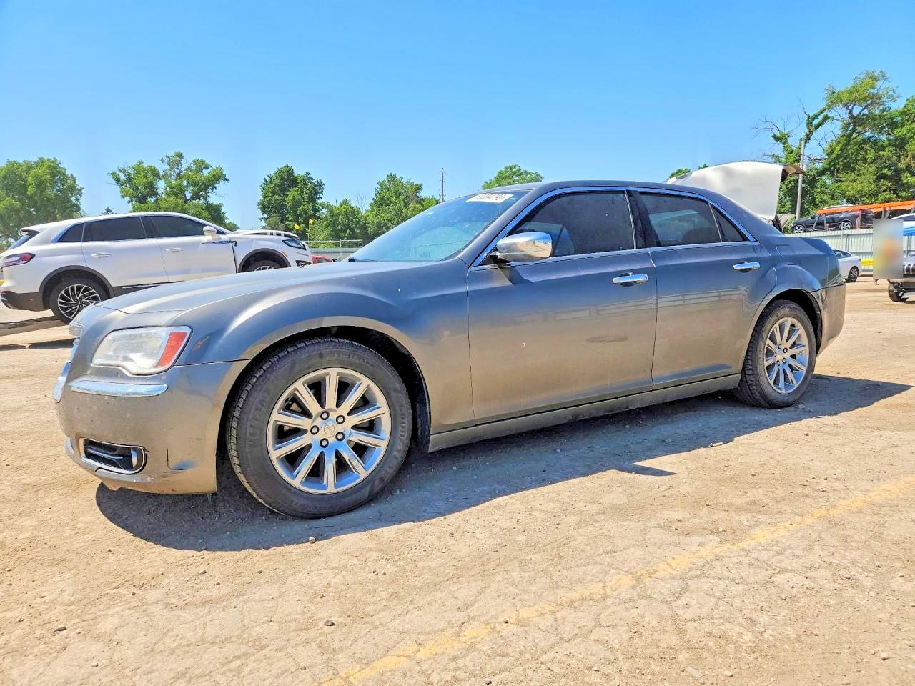 2012 Chrysler 300 VIN 2C3CCACG8CH308363 photo 1