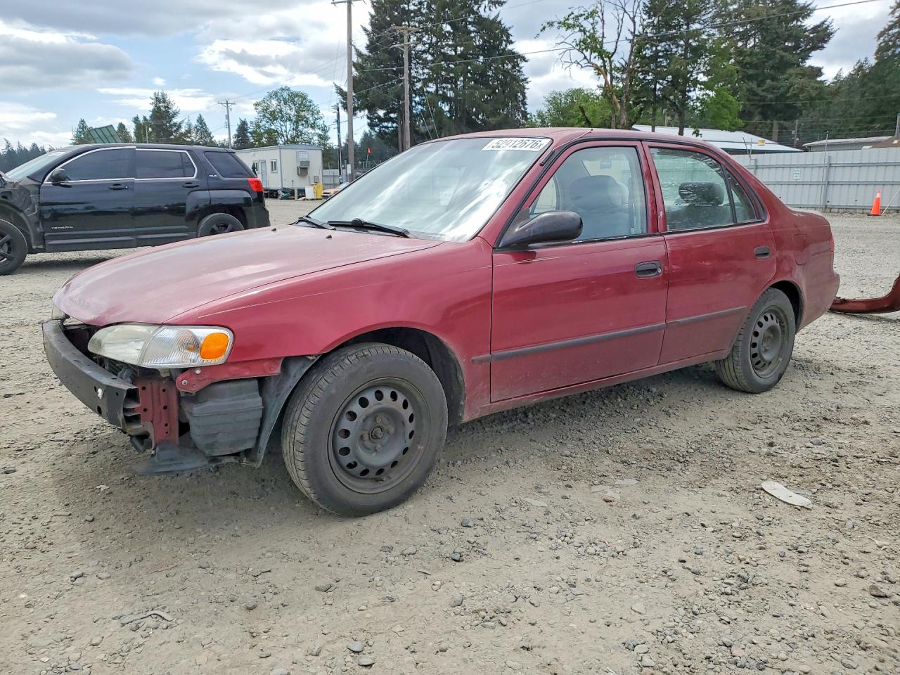 1999 Toyota Corolla VIN 2T1BR12EXXC749188 photo 1