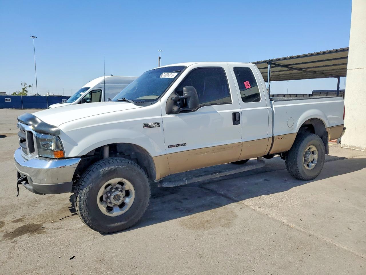 1999 Ford F250 VIN 1FTNX21F3XEC30760 photo 1