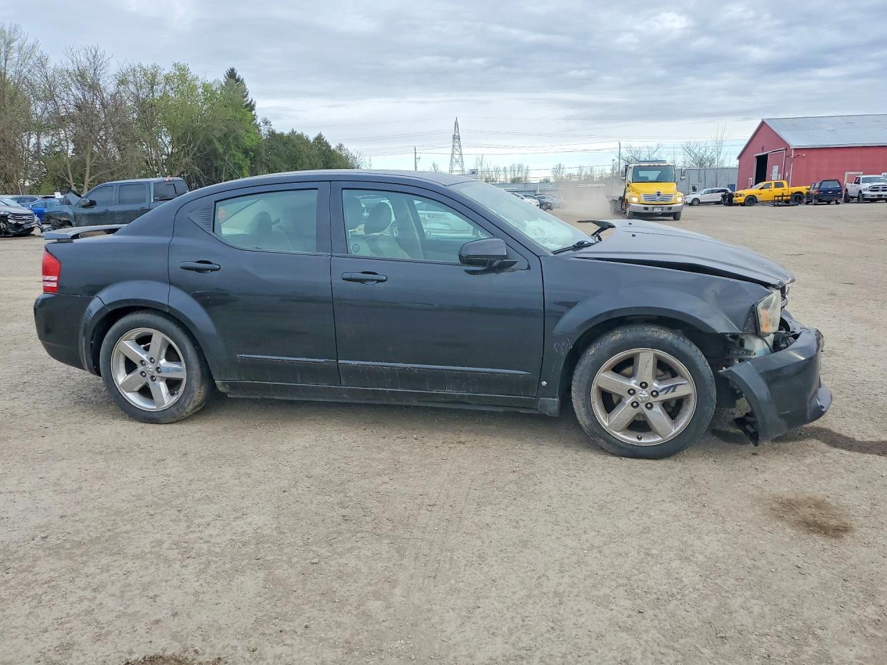 2009 Dodge Avenger VIN 1B3LC76V59N525542 photo 4