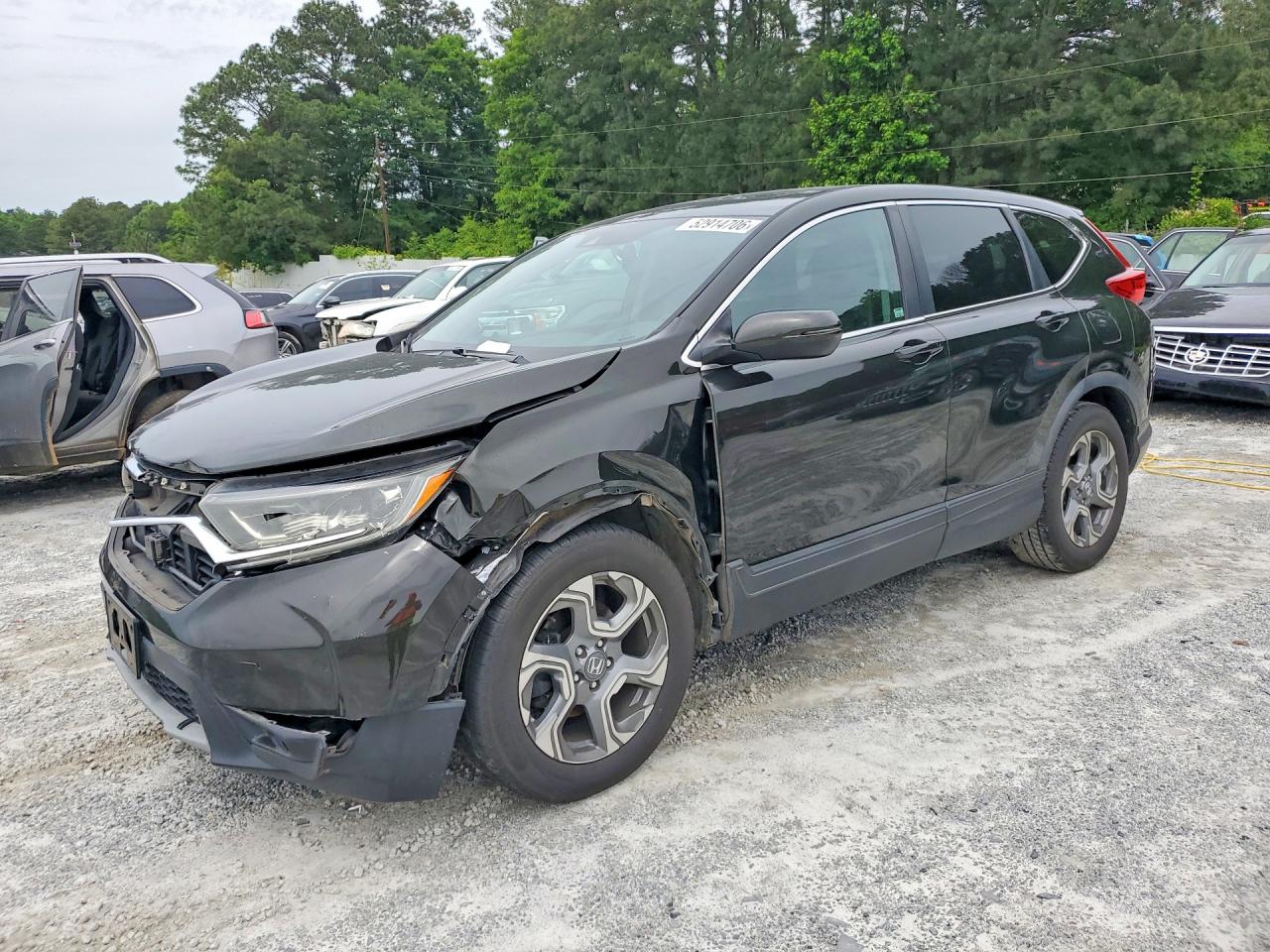 2017 Honda Crv VIN 7FARW1H80HE020711 photo 1
