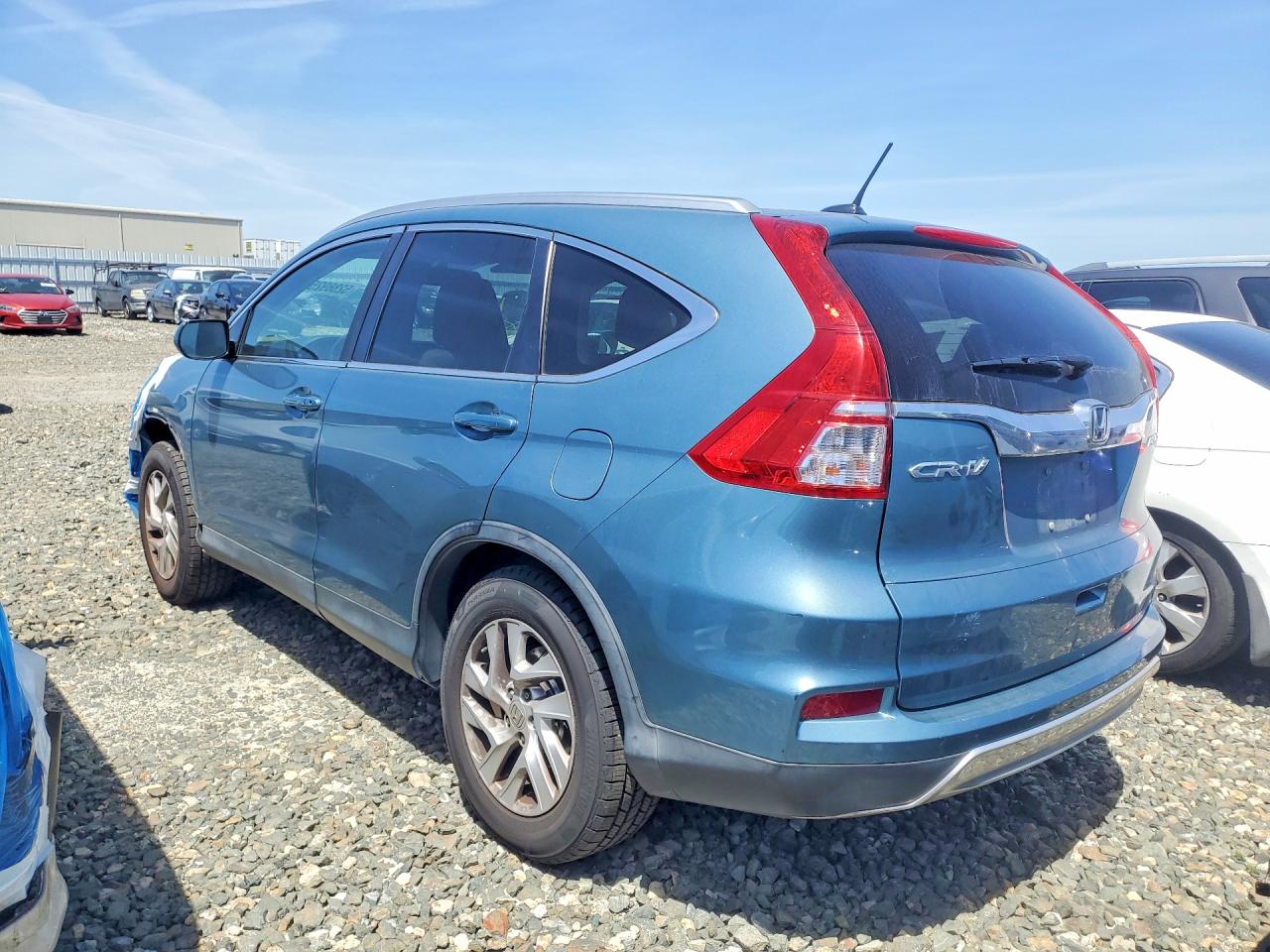 2015 HONDA Crv VIN 5J6RM4H74FL111107 photo 2