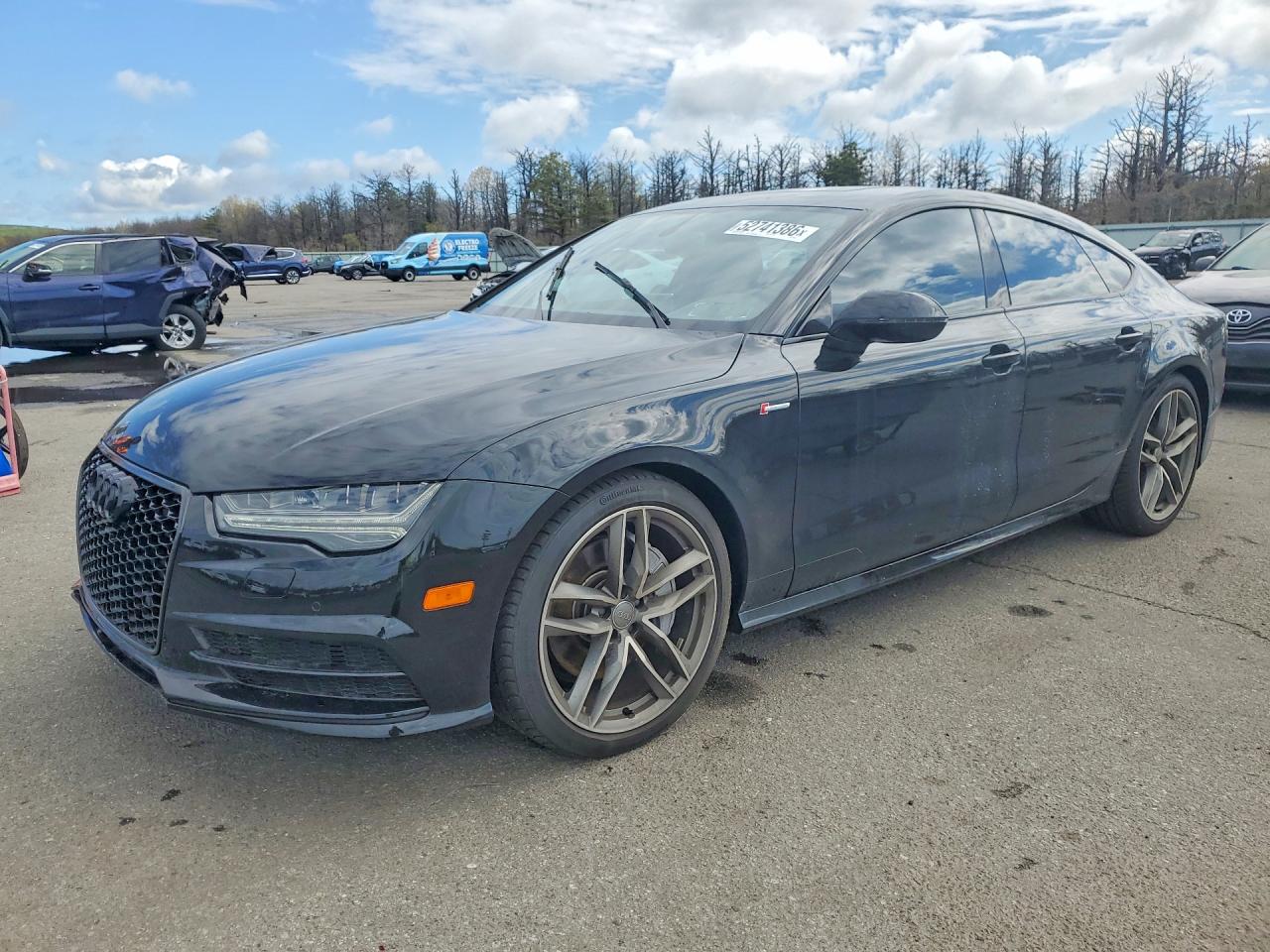 2016 Audi A7 VIN WAUWGAFC7GN078931 photo 1