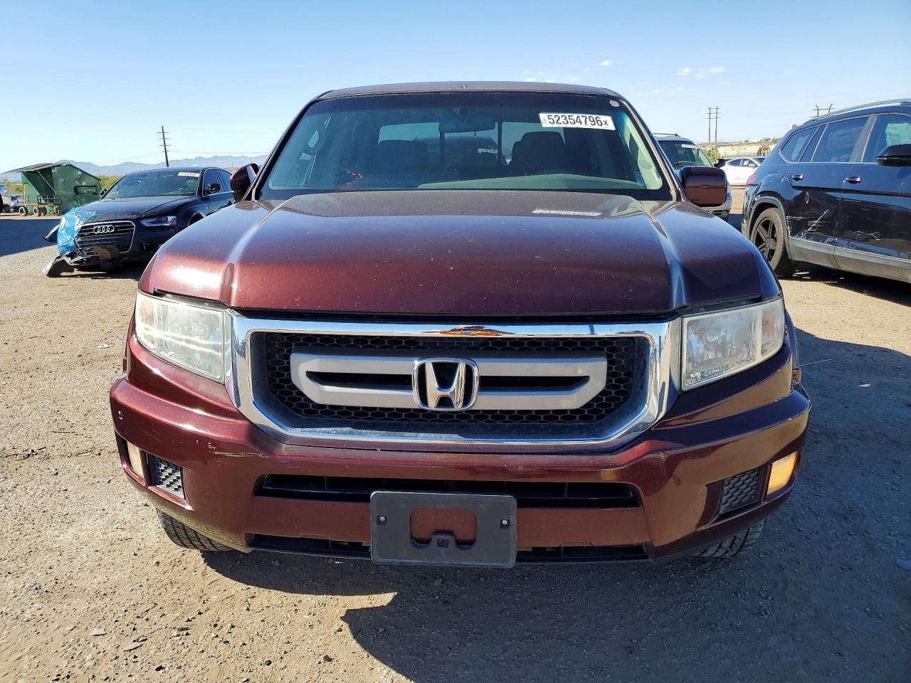 2011 Honda Ridgeline VIN 5FPYK1F41BB010965 photo 5
