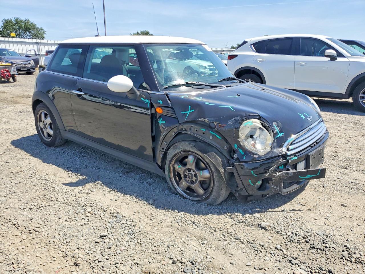 2010 MINI Cooper VIN WMWMF3C53ATZ65232 photo 4