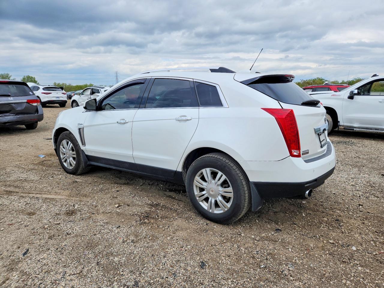 2016 Cadillac Srx VIN 3GYFNBE31GS500627 photo 2