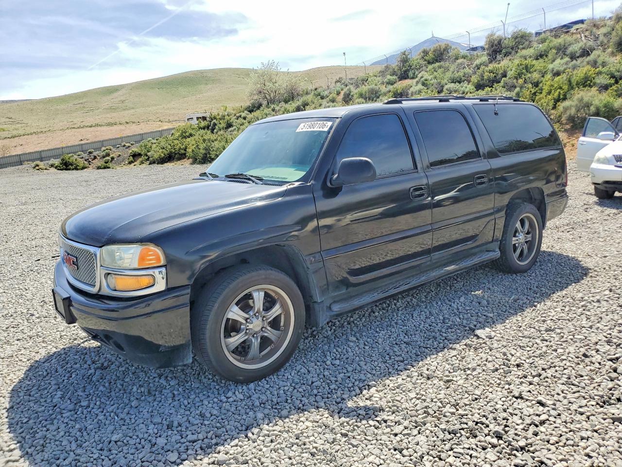2001 GMC Denali VIN 1GKFK66U61J282176 photo 1