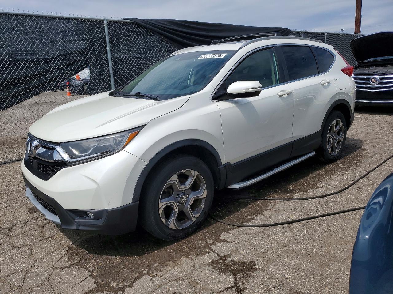 2018 Honda Crv VIN 2HKRW2H85JH665640 photo 1