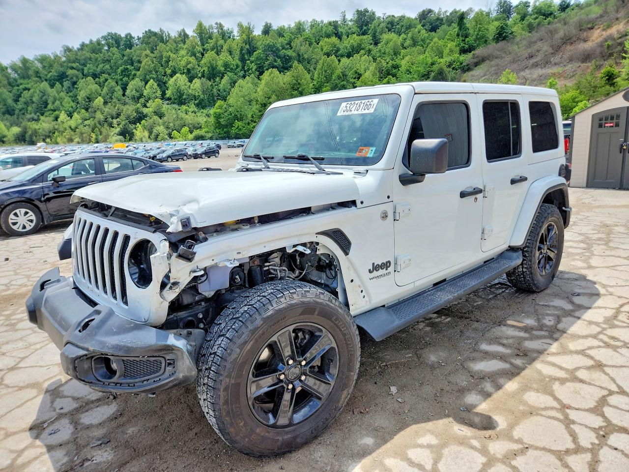 2020 Jeep Wrangler / VIN 1C4HJXEN5LW145288 photo 1