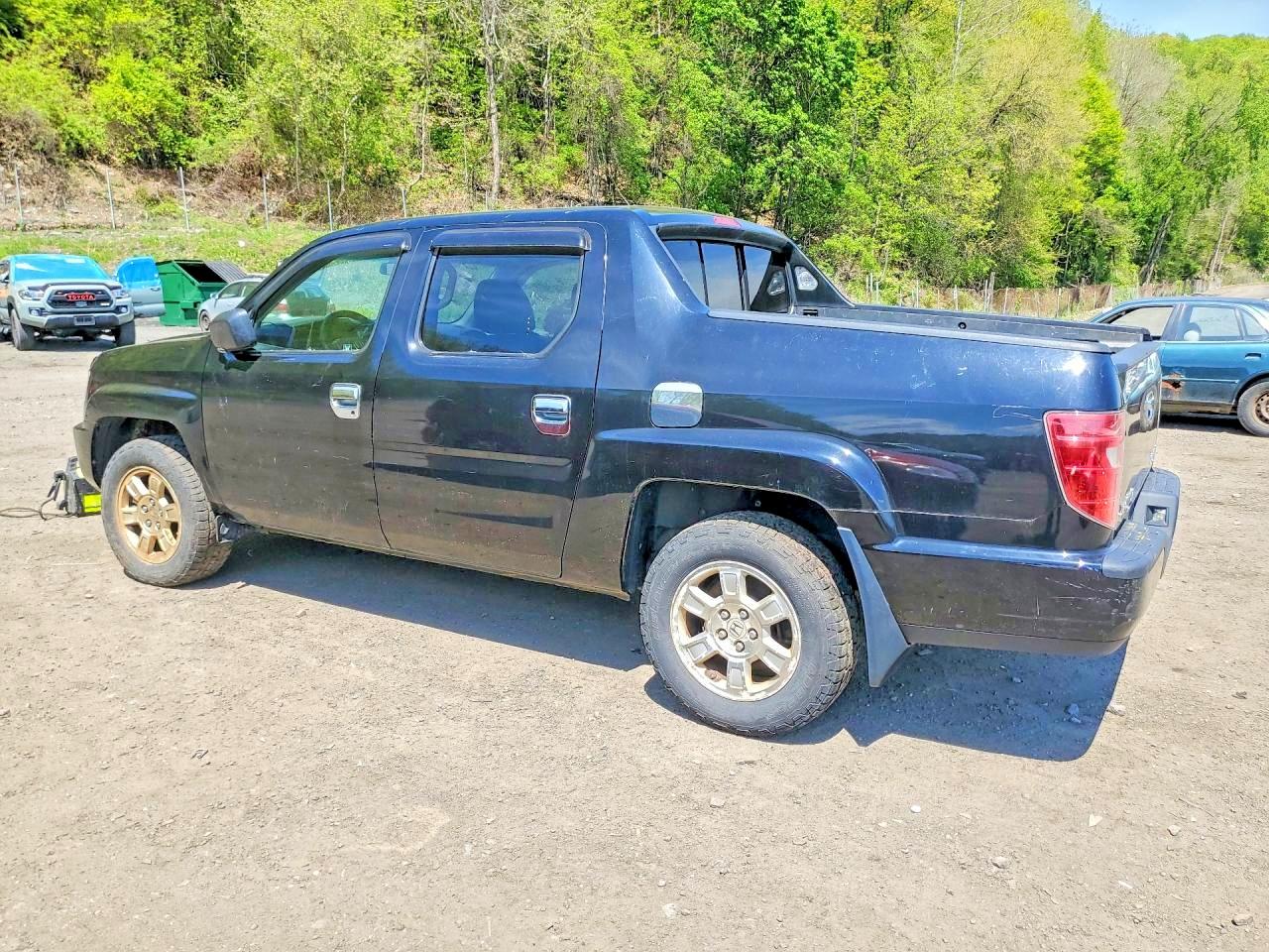2011 Honda Ridgeline VIN 5FPYK1F48BB004242 photo 2