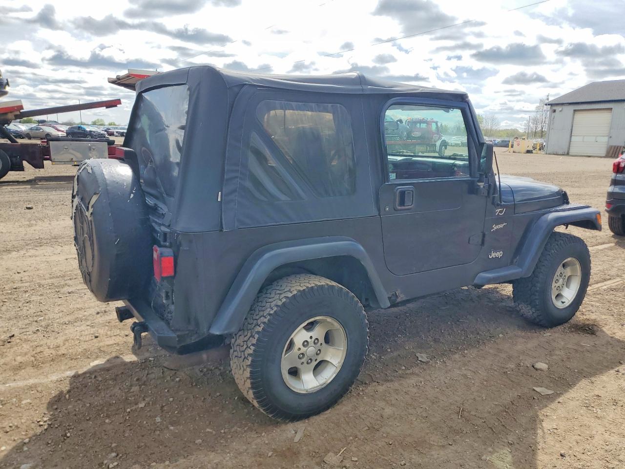 2002 Jeep Wrangler / VIN 1J4FA49S22P768280 photo 3