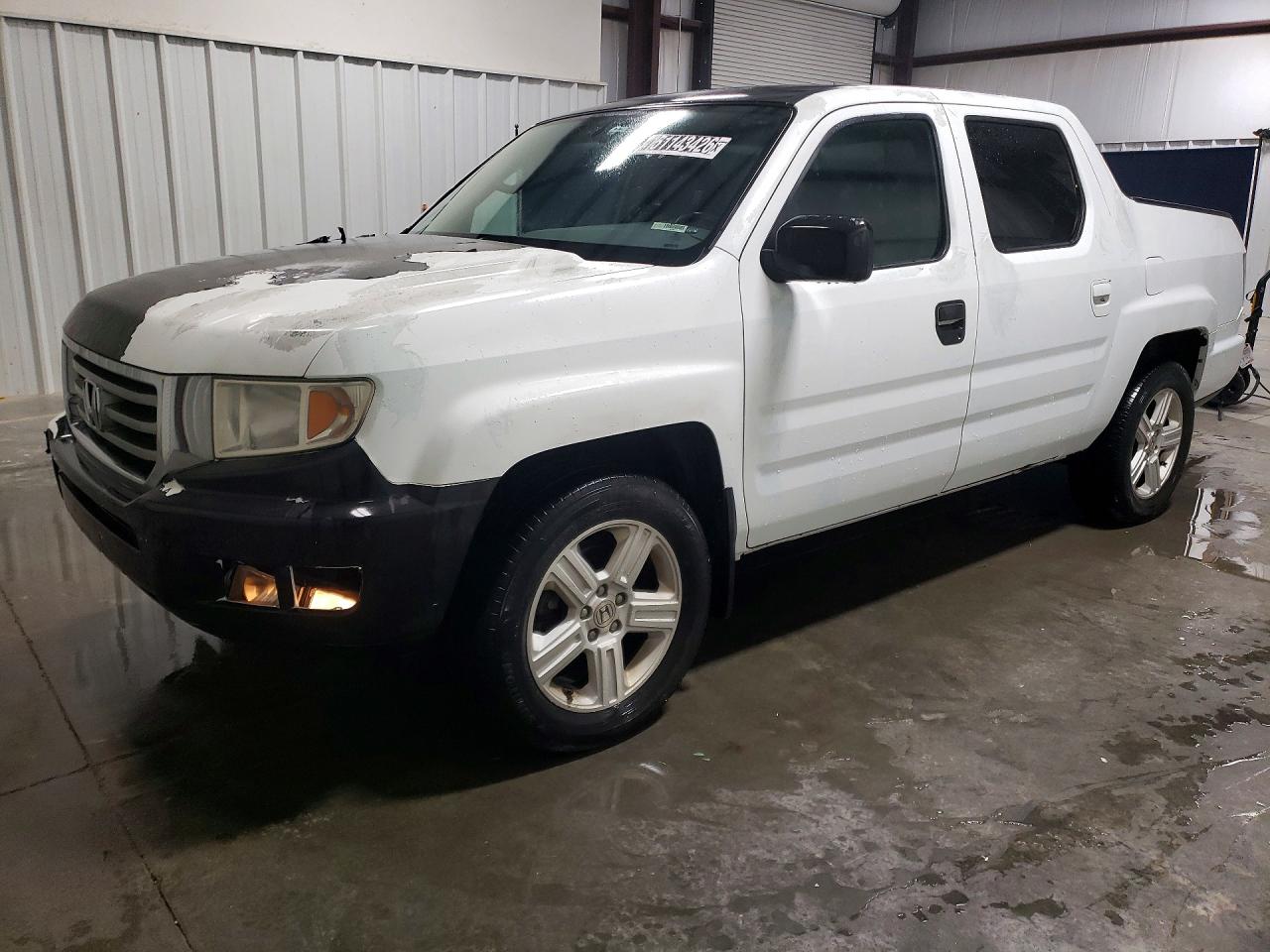 2013 Honda Ridgeline VIN 5FPYK1F55DB012701 photo 1