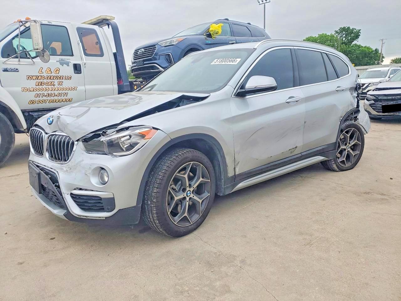 2019 BMW X1 VIN WBXHU7C50K3H44258 photo 1