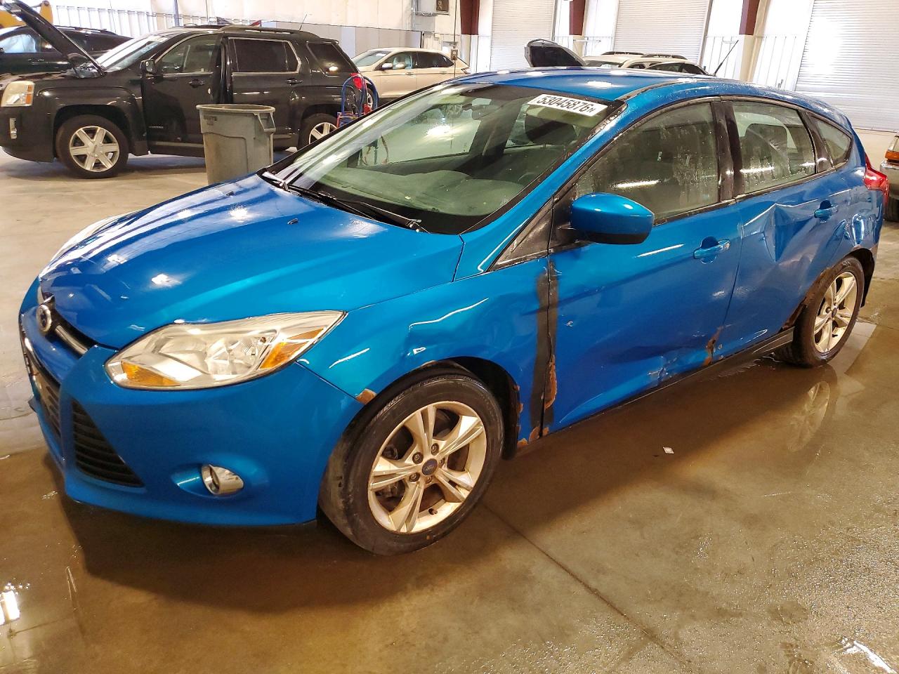 2012 Ford Focus VIN 1FAHP3K21CL446293 photo 1