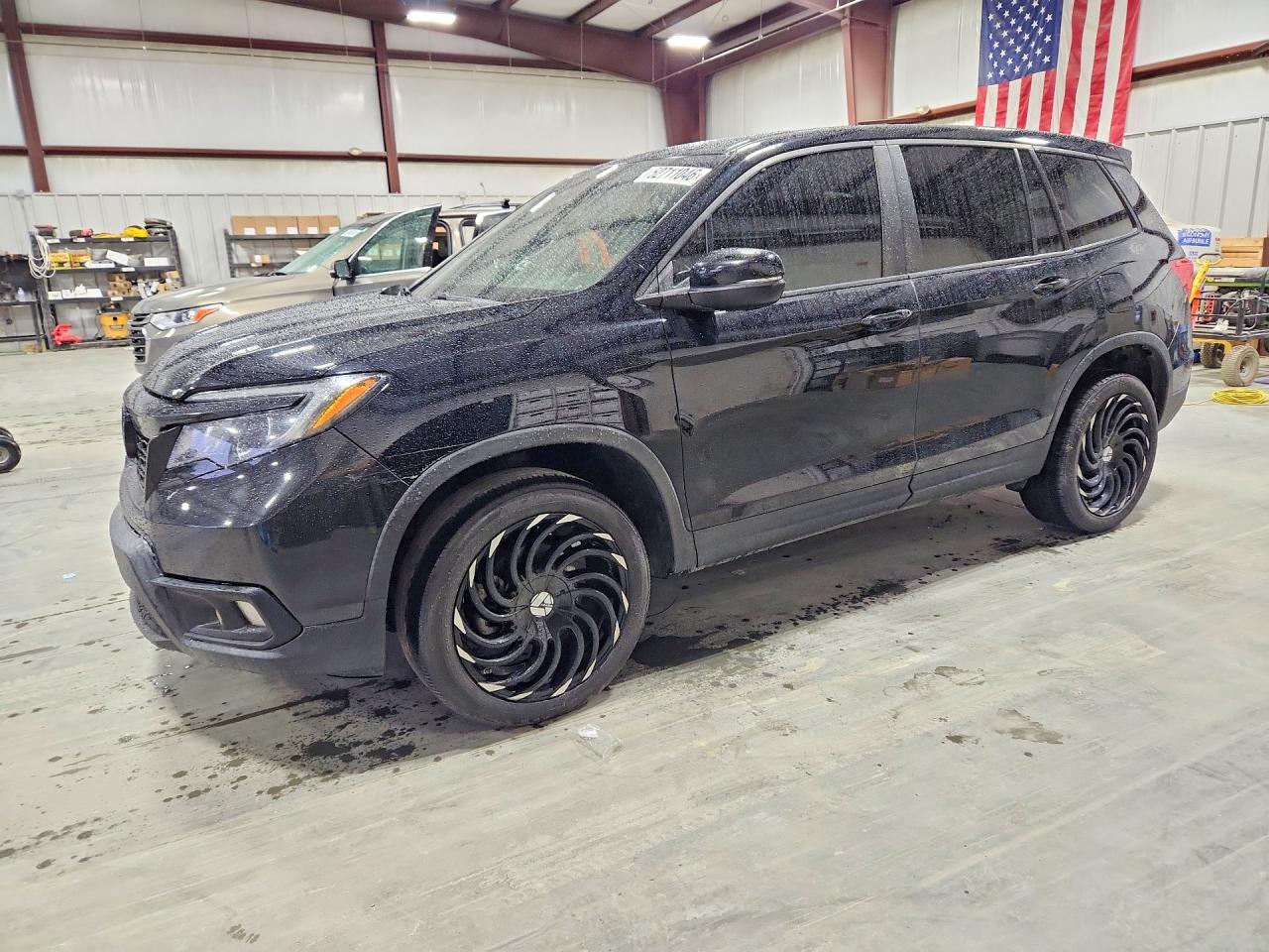 2021 Honda Passport VIN 5FNYF8H58MB011142 photo 1