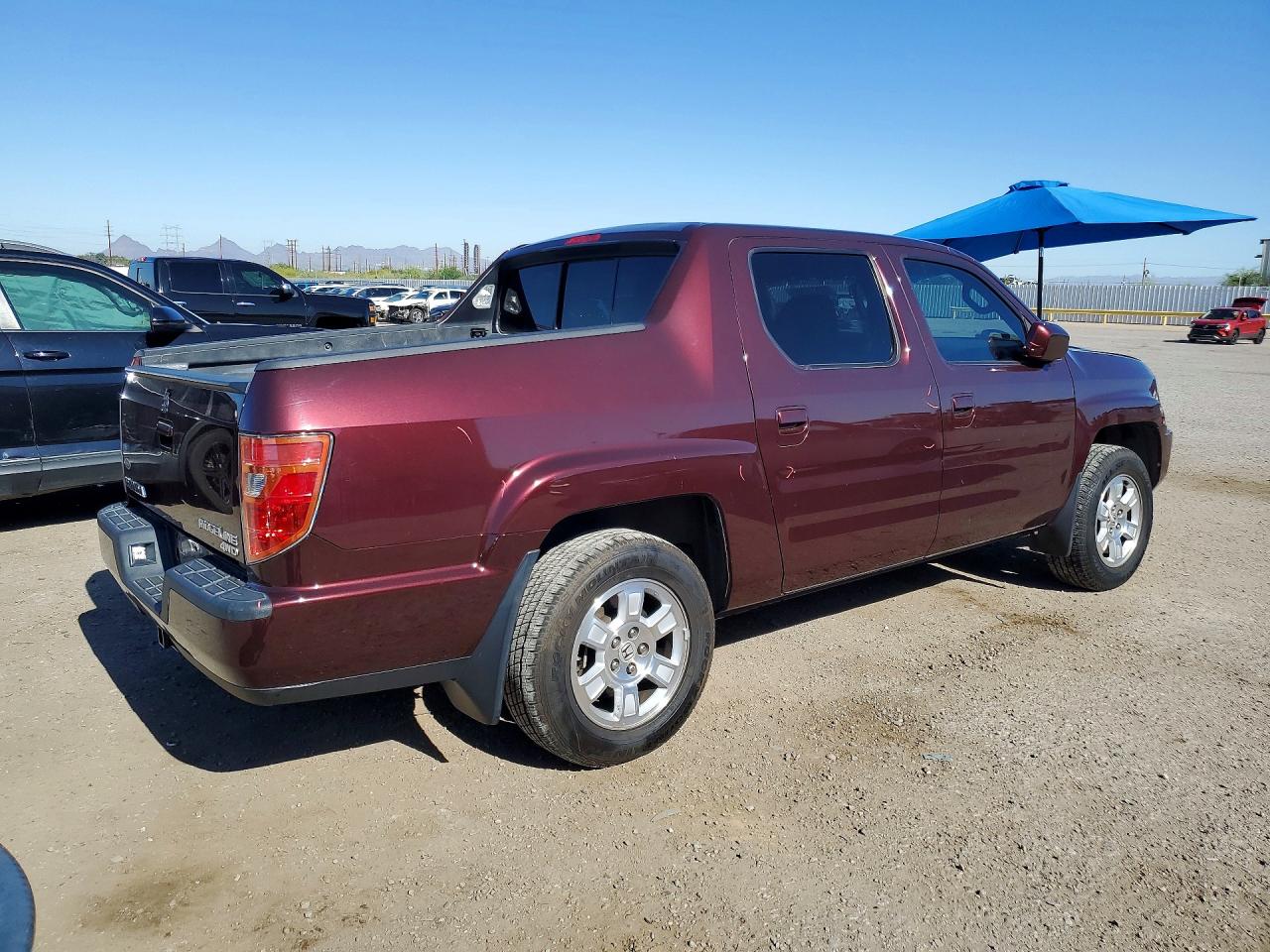 2011 Honda Ridgeline VIN 5FPYK1F41BB010965 photo 3