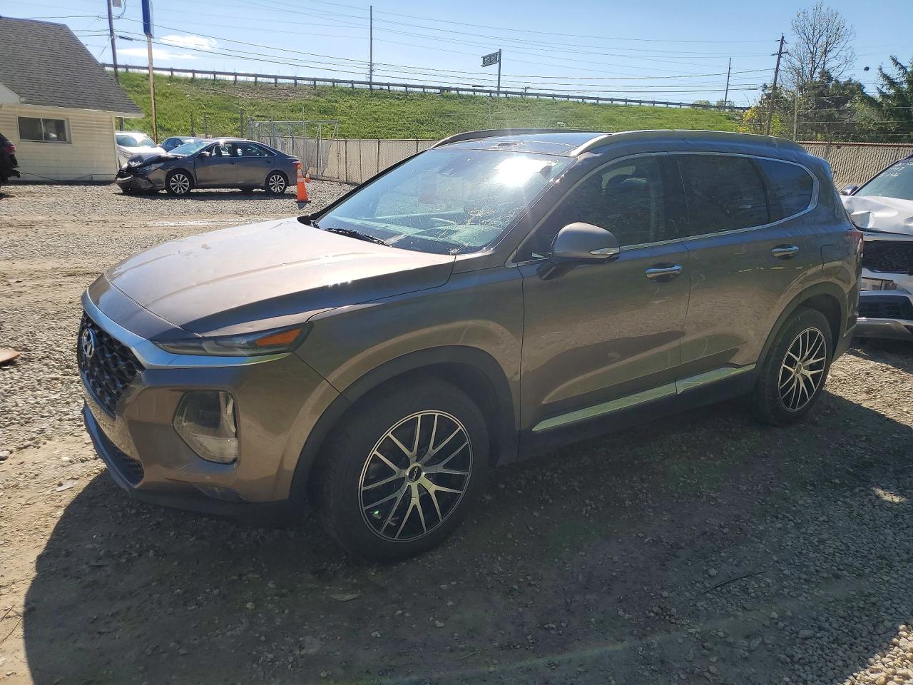2019 Hyundai Santa fe VIN 5NMS5CAA3KH066242 photo 1
