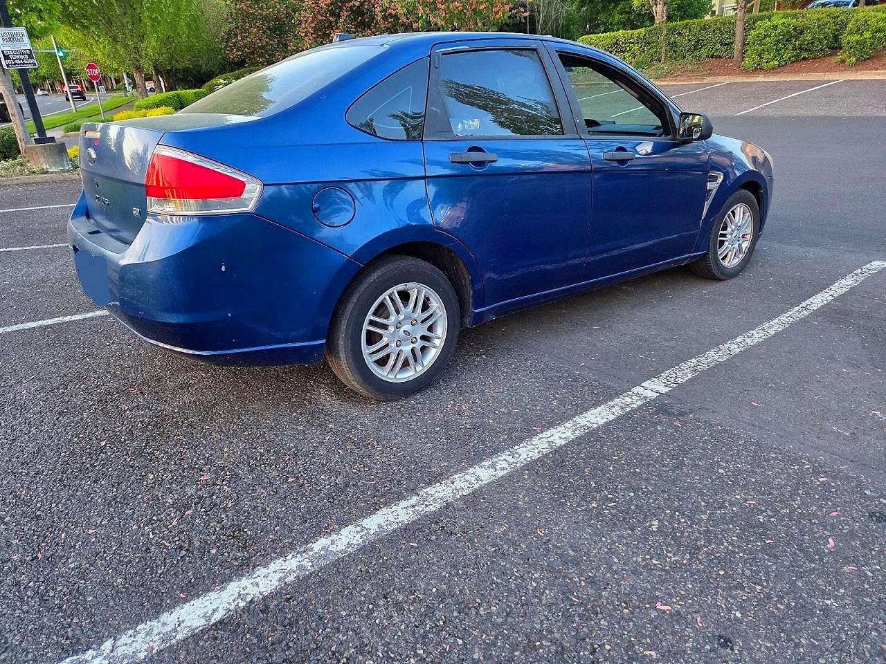 2009 Ford Focus VIN 1FAHP35N29W118507 photo 4